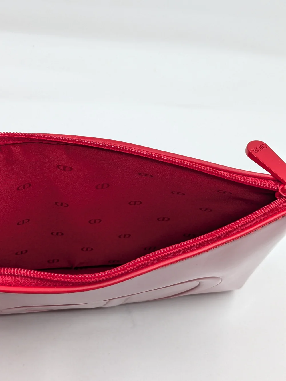 Red Patent Cosmetic Pouch — Designer Embossed Logo